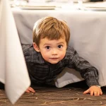 At My FIL’s Funeral, My 4-Year-Old Was Crawling Under the Table – What He Saw There Turned Our Lives Upside Down