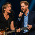 “He’s Got A Voice And The Heart To Match!” – Keith Urban couldn’t hide his awe after Prince Harry took the stage at the Grand Ole Opry for a jaw-dropping surprise duet that set the internet ablaze. The crowd froze as Prince Harry stepped into the spotlight beside Urban, guitar slung over his shoulder. What followed was a soulful, stripped-down rendition of “To Love Somebody” — and when Harry began to sing, time seemed to stop. His warm, raspy voice melted through the silence, leaving the Nashville crowd in stunned disbelief. Phones trembled, eyes welled up, and backstage, Meghan Markle was seen wiping away tears, her hand pressed to her heart as she whispered, “That’s my husband.” By the time the final chord faded, the arena erupted — and social media with it. Fans aren’t just calling it a performance… they’re calling it Harry’s musical rebirth.