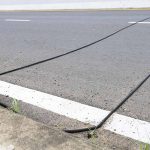 Spotted Black Cables on the Road? Here’s What They Actually Do (And What You Should Never Do)