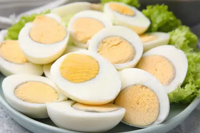 Why does a green ring appear around hard-boiled eggs?