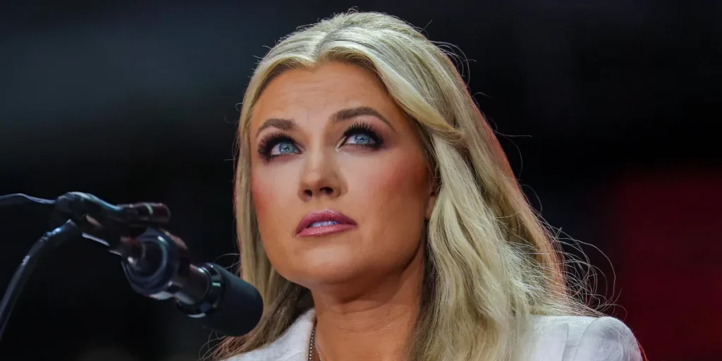 Erika Kirk Surprises Crowd with Hand Gesture Toward Charlie Kirk’s Photo After Hug from Trump