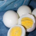 Why does a green ring appear around hard-boiled eggs?