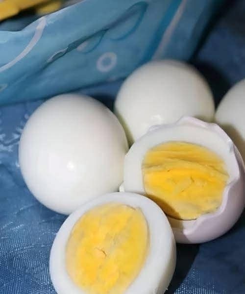Why does a green ring appear around hard-boiled eggs?